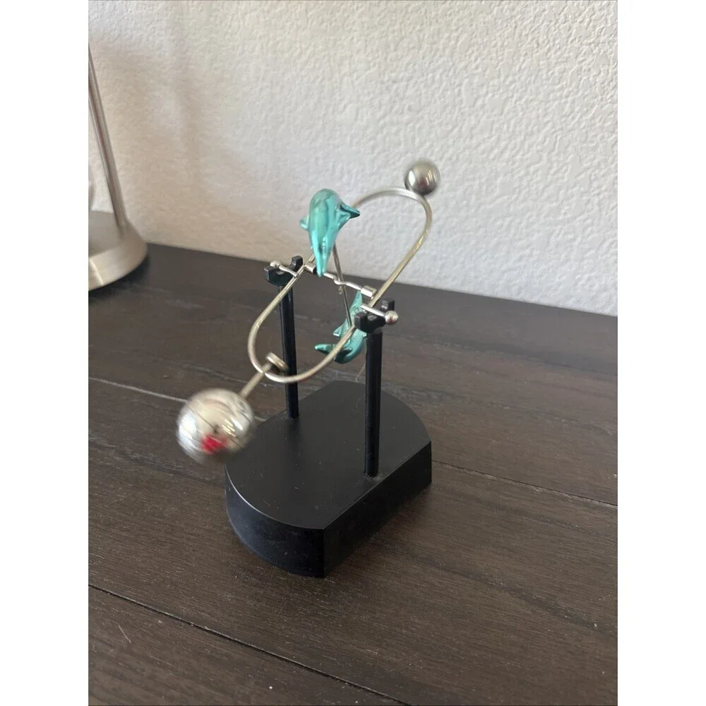 Blue Dolphin KINETIC METAL ART MOTION balancing spinning desktop science toy